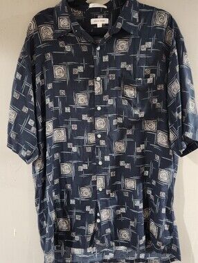 vintage Pierre Cardin men's short-sleeve button-down shirt featuring an abstract